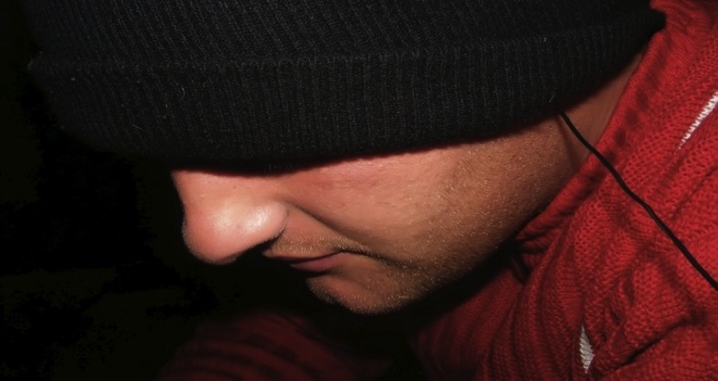 beware of the man in the black hat